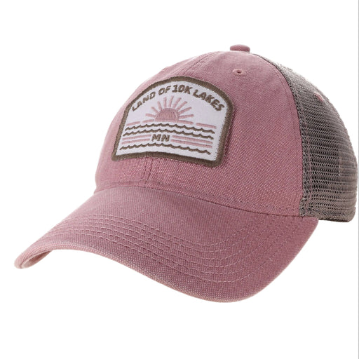 A dusty pink trucker cap with a mesh back and a front patch reading 'Land of 10K Lakes MN' with a sun and waves graphic.